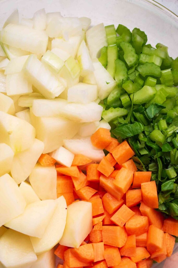 Diced onions celery and carrots for the creamy chicken stew with dumplings