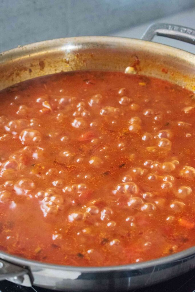 tomato and onion sauce in a pan simmering #pap #paptert #tamatoonionsauce #pap #paptert